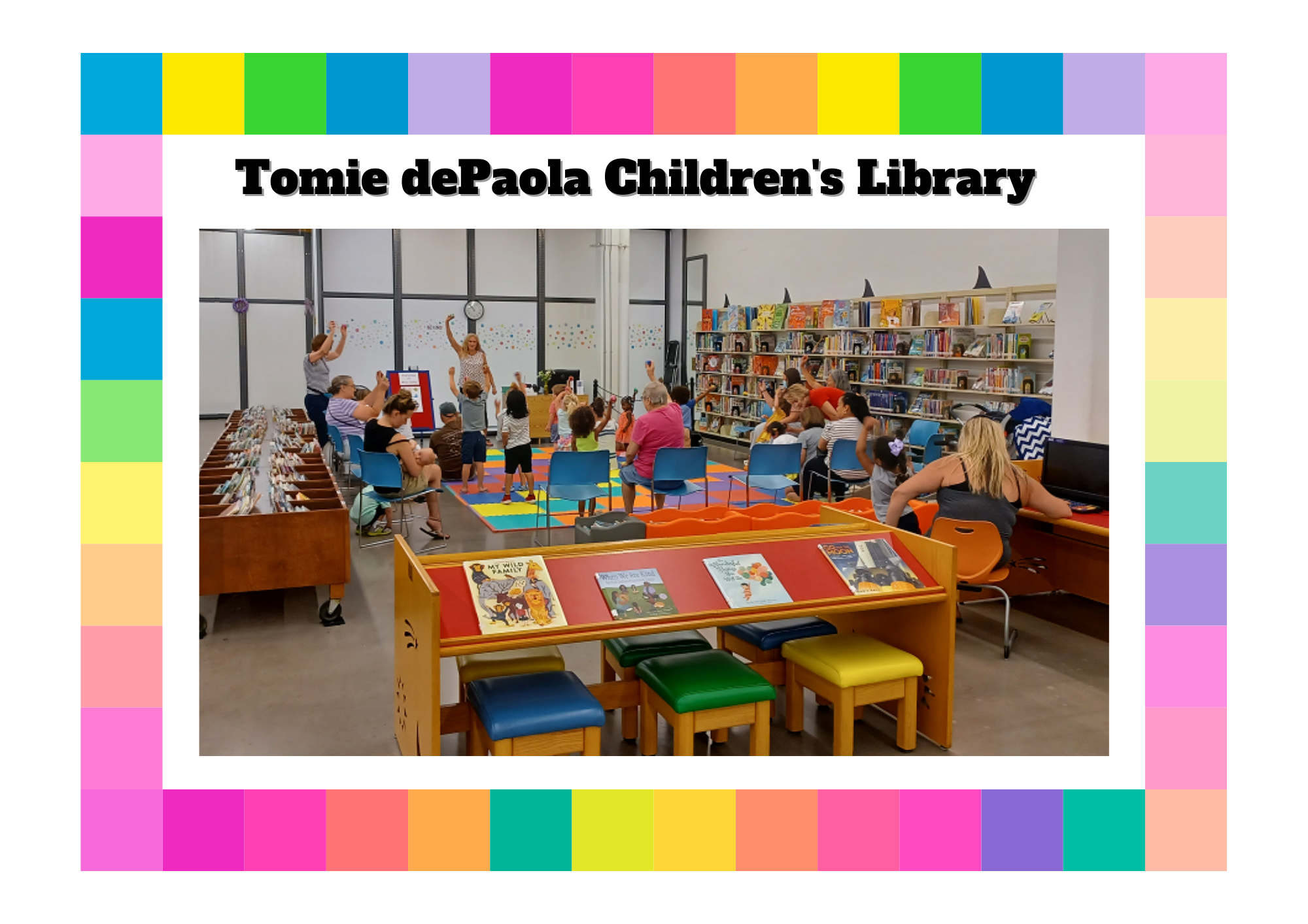 Tomie dePaola Children's Library image showing the children's section full of kids and parents