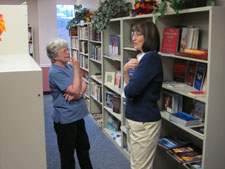 Two guests talking in the bookstore