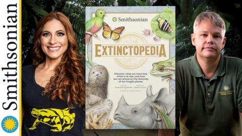 Extinctopedia book between two scientist