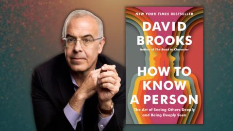 David Brooks to left of his book