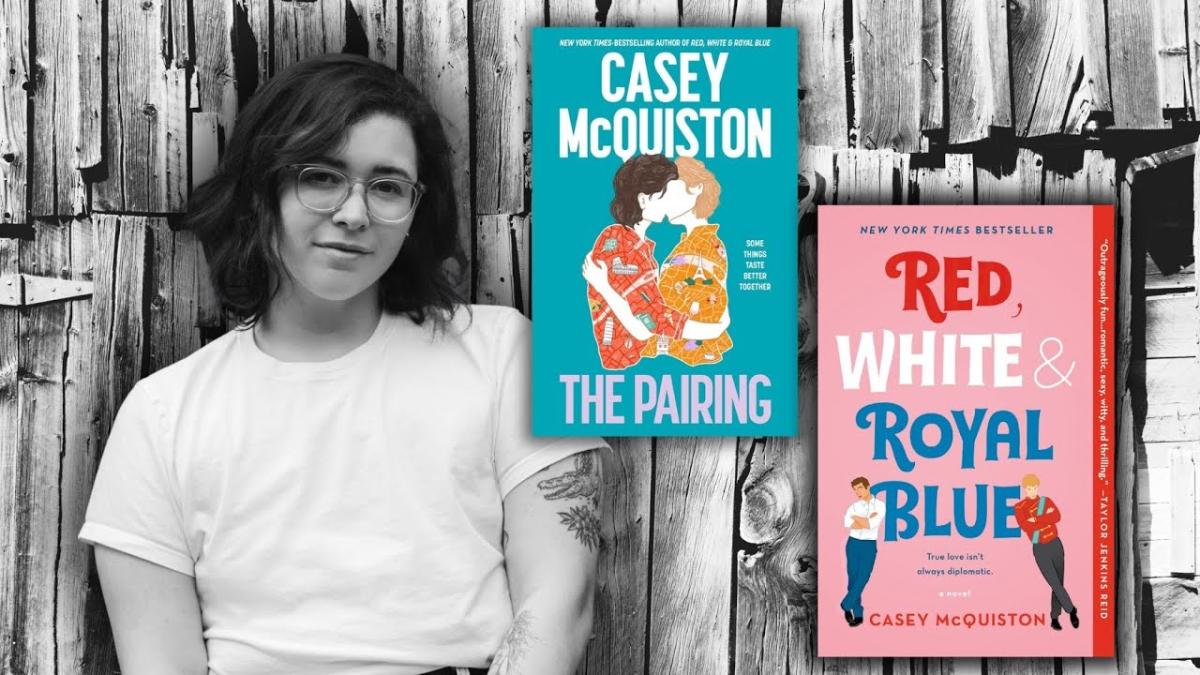 Casey McQuiston to left of two of her novels