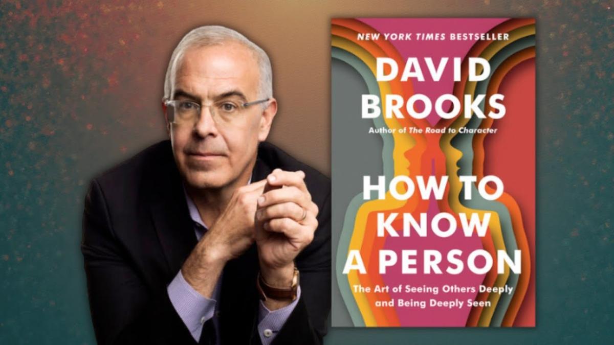 David Brooks to left of his book